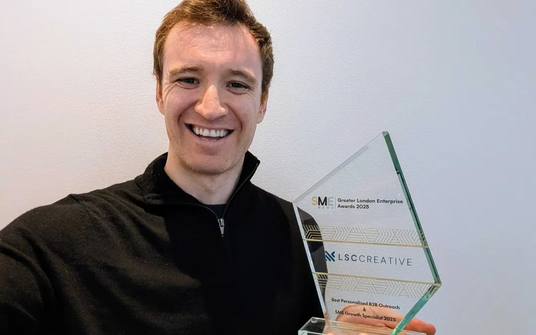 Leo holding an award we received showing how our award-winning LinkedIn approach made an impact in 2025